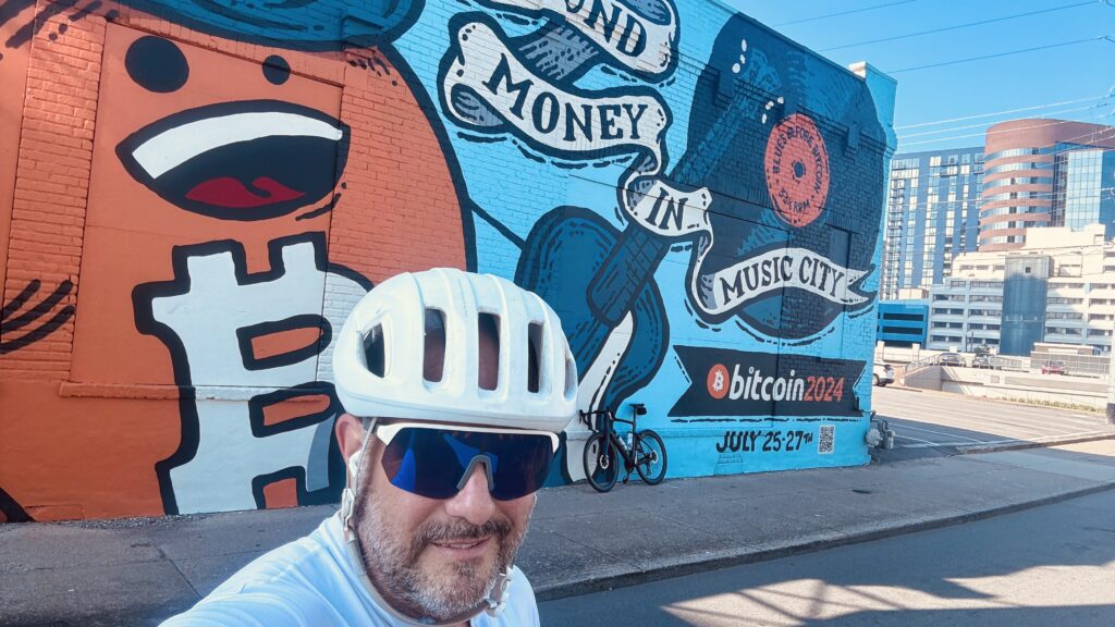 Chad Everett Harris in Nashville in front of the Nashville Bitcoin painting on Hwy 70.