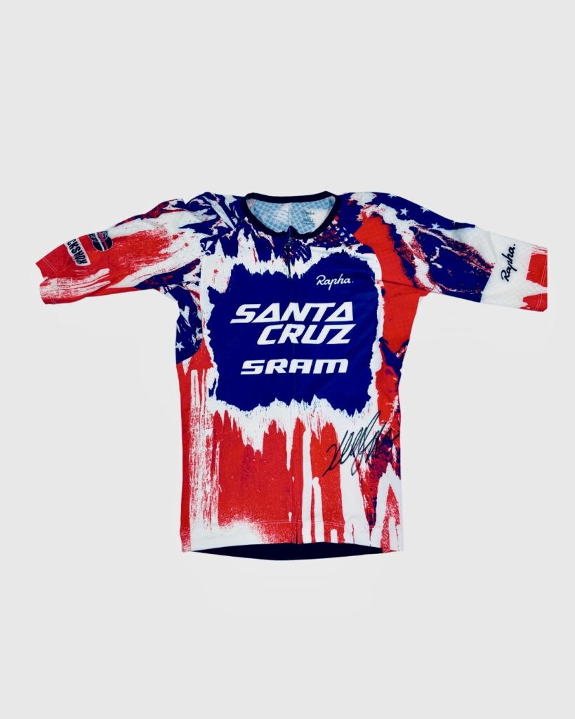 Chad Everett Harris received this signed cycling jersey from team members at WWT.